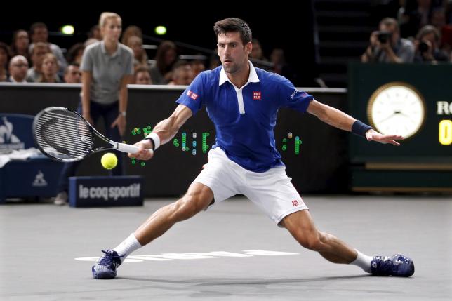 World number one Novak Djokovic of Serbia returns to Britain's Andy Murray during their men's singles final tennis match at the Paris Masters tennis tournament November 8, 2015. REUTERS/Charles Platiau