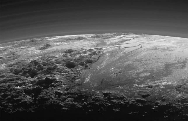 A close-up view of the rugged, icy mountains and flat ice plains on Pluto is seen in an image from NASA's New Horizons spacecraft taken July 14, 2015 and released September 17, 2015. REUTERS/NASA/JHUAPL/SwRI/Handout via Reuters