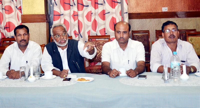 Sadbhawana Party Chairman Rajendra Mahato (2nd from left) speaks with journalists in Birgunj of Parsa, on Wednesday, November 4, 2015. Photo: Ram Sarraf