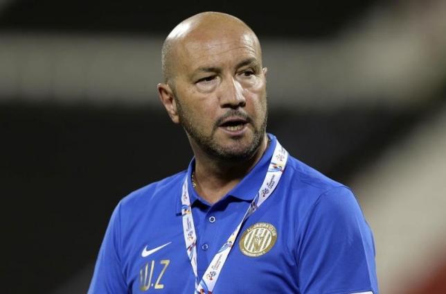 Al-Jazira UAE head coach Walter Zenga of Italy reacts during their AFC Championship League soccer match against Qatar Al-Rayyan in Doha April 16, 2014.REUTERS/Fadi Al-Assaad
