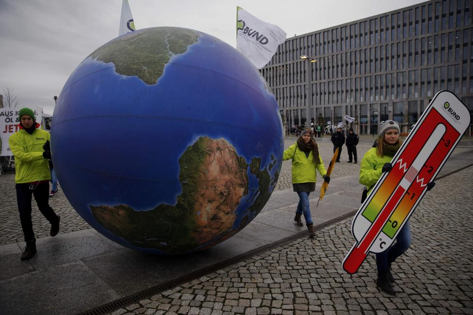 Protesters demonstrate during a rally held the day before the start of the Paris Climate Change Summit in Berlin, Germany, November 29, 2015. REUTERS/Pawel Kopczynski