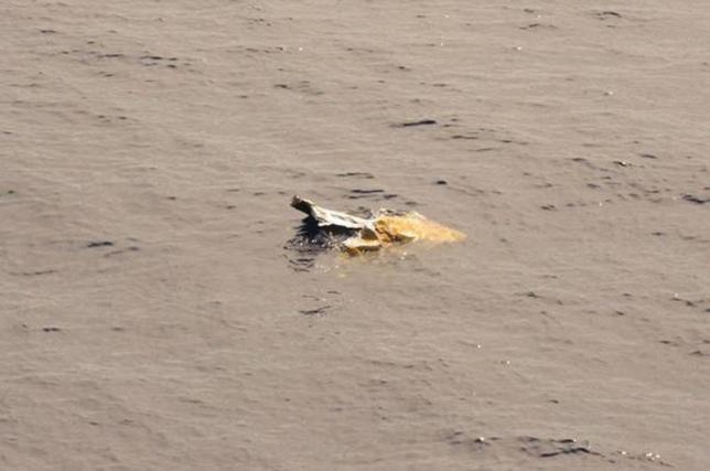 Debris is seen in the water from the El Faro search area in this handout photo provided by the US Coast Guard, October 6, 2015. REUTERS/US Coast Guard/Handout via Reuters