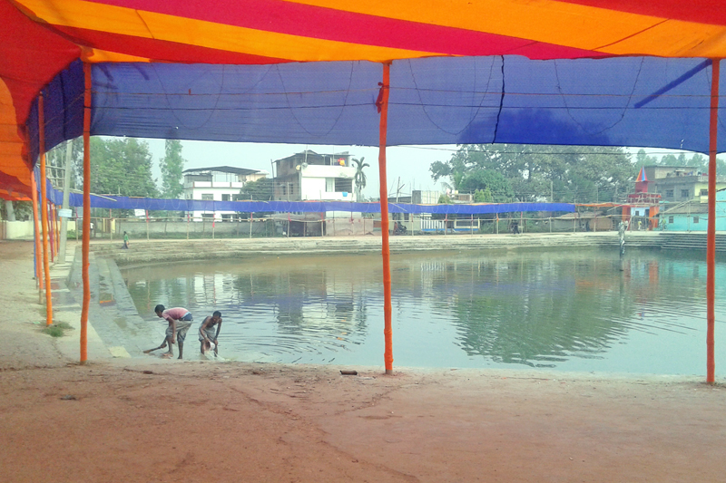 People decorating the edge of a pond for the Chhath festival in Rautahat district headquarters, Gaur, on Sunday, November 15, 2015. Photo: Prabhat Kumar Jha/ THT