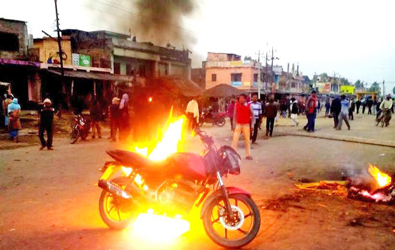 A motorcycle set on fire by United Democratic Madhesi Front (UDMF) in Rupni of Saptari district on Sunday, November 22, 2015.  Photo Caption: Byas Shankar Upadhyaya
