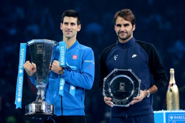 Tennis - Barclays ATP World Tour Finals - O2 Arena, London - 22/11/15nMen's Singles Final -  Serbia's Novak Djokovic and Switzerland's Roger Federer pose with their trophies after their matchnPhoto: Reuters 