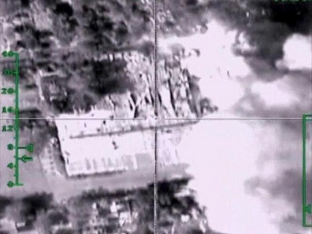 A frame grab taken from a footage released by Russia's Defence Ministry November 5, 2015, shows what Russia says is smoke rising after air strikes carried out by the Russian air force on a militants' training camp in Aleppo province, Syria.  REUTERS/Ministry of Defence of the Russian Federation/Handout via Reuters