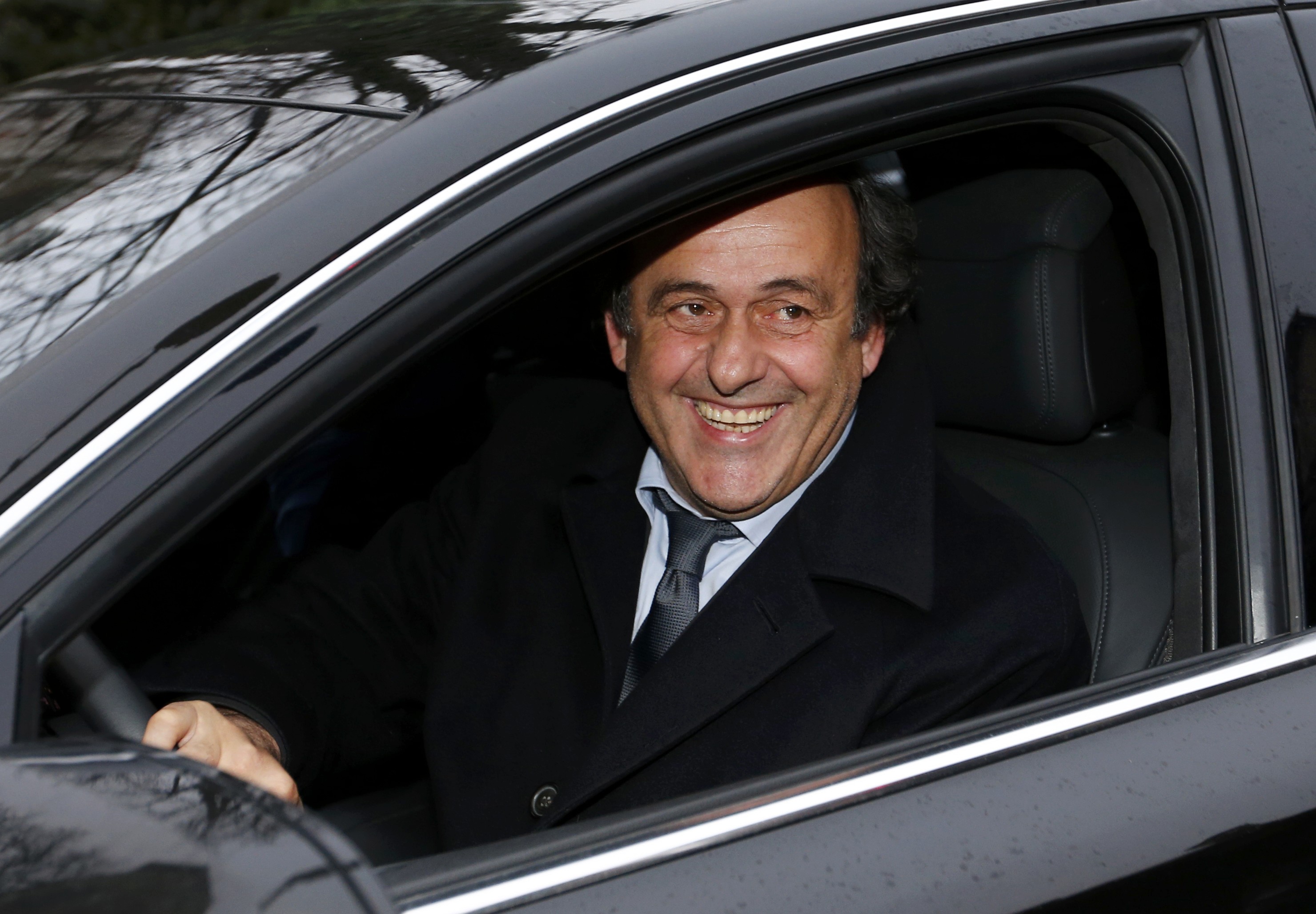 UEFA President Michel Platini leaves after a hearing at the Court of Arbitration for Sport (CAS) in Lausanne, Switzerland December 8, 2015. Photo: Reuters