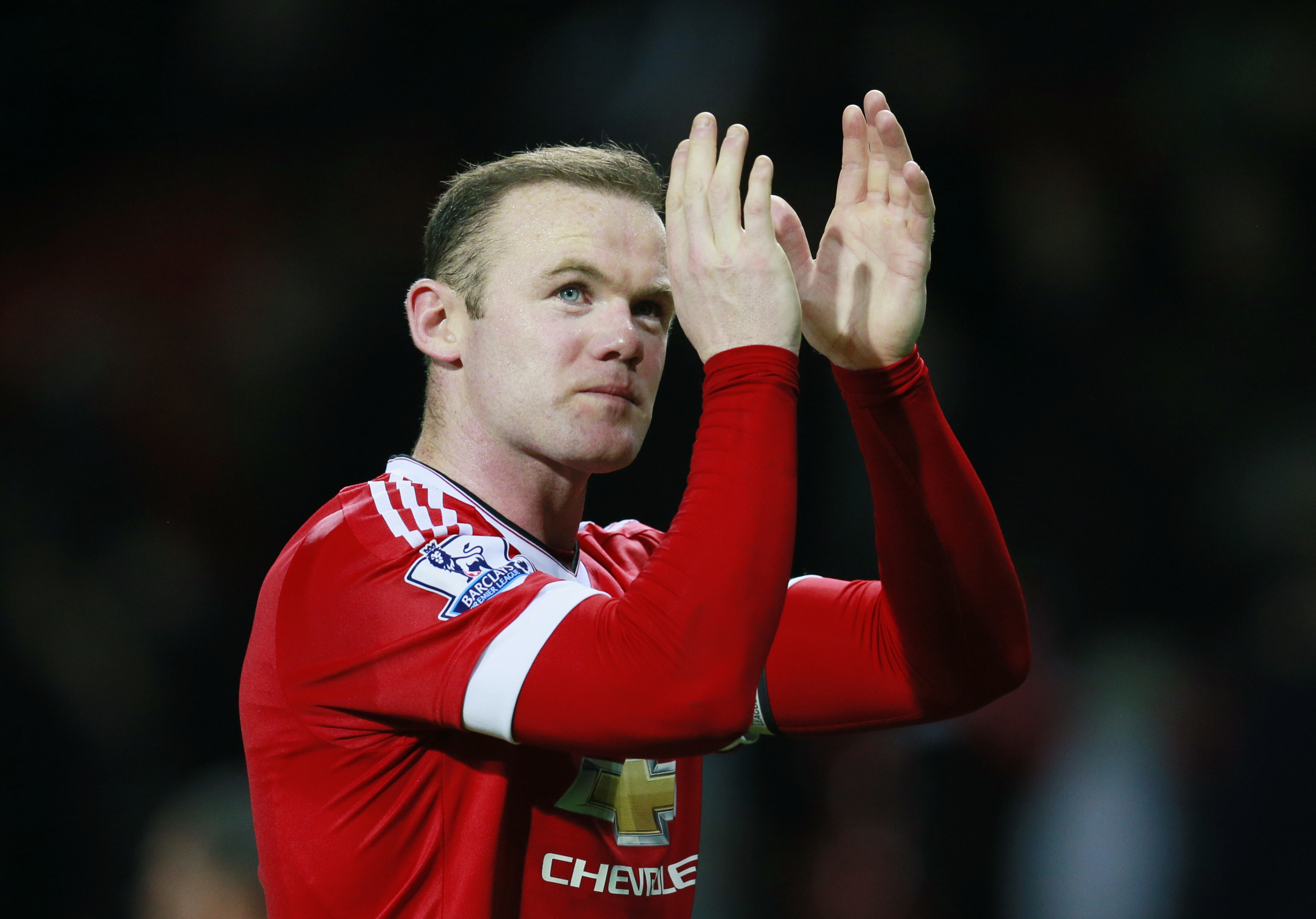 Manchester United's Wayne Rooney applauds their fans as he looks dejected after the game against Chelsea at Old Trafford on Monday, December 28, 2015. Photo: Reuters