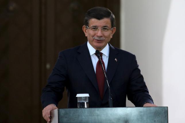 Turkish Prime Minister Ahmet Davutoglu  speaks to the media during a visit to northern Cyprus, December 1, 2015. REUTERS/Yiannis Kourtoglou