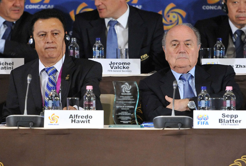 Alfredo Hawit of Honduras, left, interim Head of CONCACAF and FIFA President Joseph Blatter sit next to each otheron May 23, 2012 in Budapest, Hungary. Photo: AP