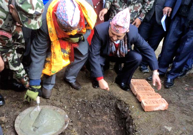 Prime Minister KP Sharma Oli laying the foundation stone of a drinking water and sanitation project for the quake survivors in Barpak of Gorkha on Thursday, December 17, 2015. Photo: PM's twitter account