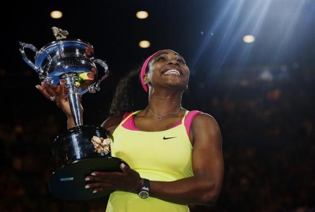 Serena Williams of the US poses with her trophy after defeating Maria Sharapova of Russia in their women's singles final match at the Australian Open 2015 tennis tournament in Melbourne January 31, 2015. Photo: Reuters
