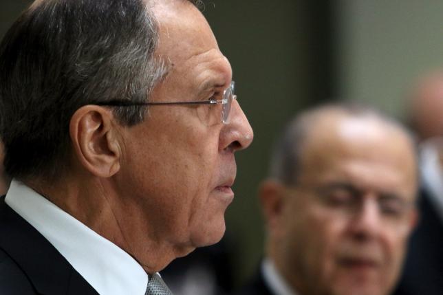 Russian Foreign Minister Sergei Lavrov and Cypriot Foreign Minister Ioannis Kasoulides (R) attend a news conference at the Ministry of Foreign Affairs in Nicosia, Cyprus December 2, 2015. REUTERS/Yiannis Kourtoglou