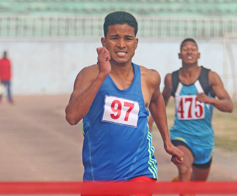 Yam Sajan Sunar of Nepal APF Club runs on his way to winning the 200m race during an open selection tournament at the Dasharath Stadium on Saturday. Photo: Udipt Singh Chhetry/THT