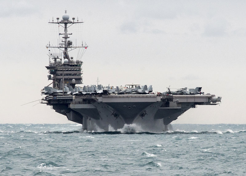 The aircraft carrier USS Harry S. Truman transits the Strait of Hormuzon on Saturday, December 26, 2015. Photo: AP