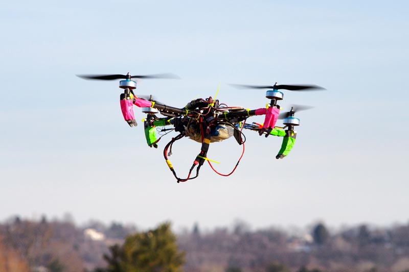 This February 1, 2014 file photo shows a small remote-controlled drone as it hovers in the sky during a meet-up of the DC Area Drone User Group in Middletown, Maryland. Photo: AFP/ File