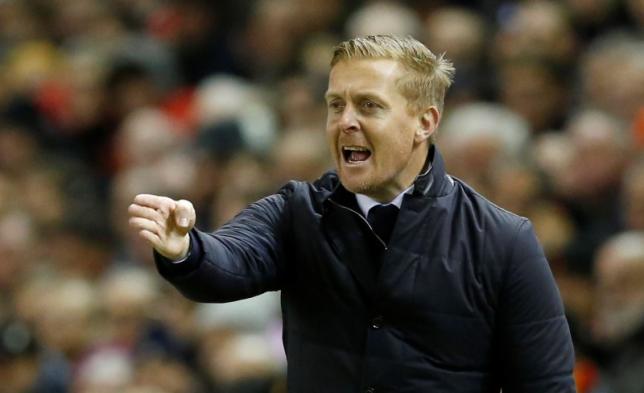 Swansea manager Garry Monk instructing players during Barclays Premier League against Liverpool at Anfield on November 29, 2015. Photo: Reuters