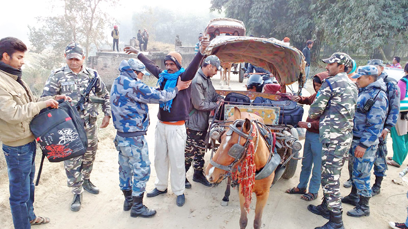 A joint team of security personnel from Nepal and India checking a horse-driven cart on the Nepal-India border at the Raxaul-Birgunj border point, on Sunday, January 24, 2016. Photo: THT