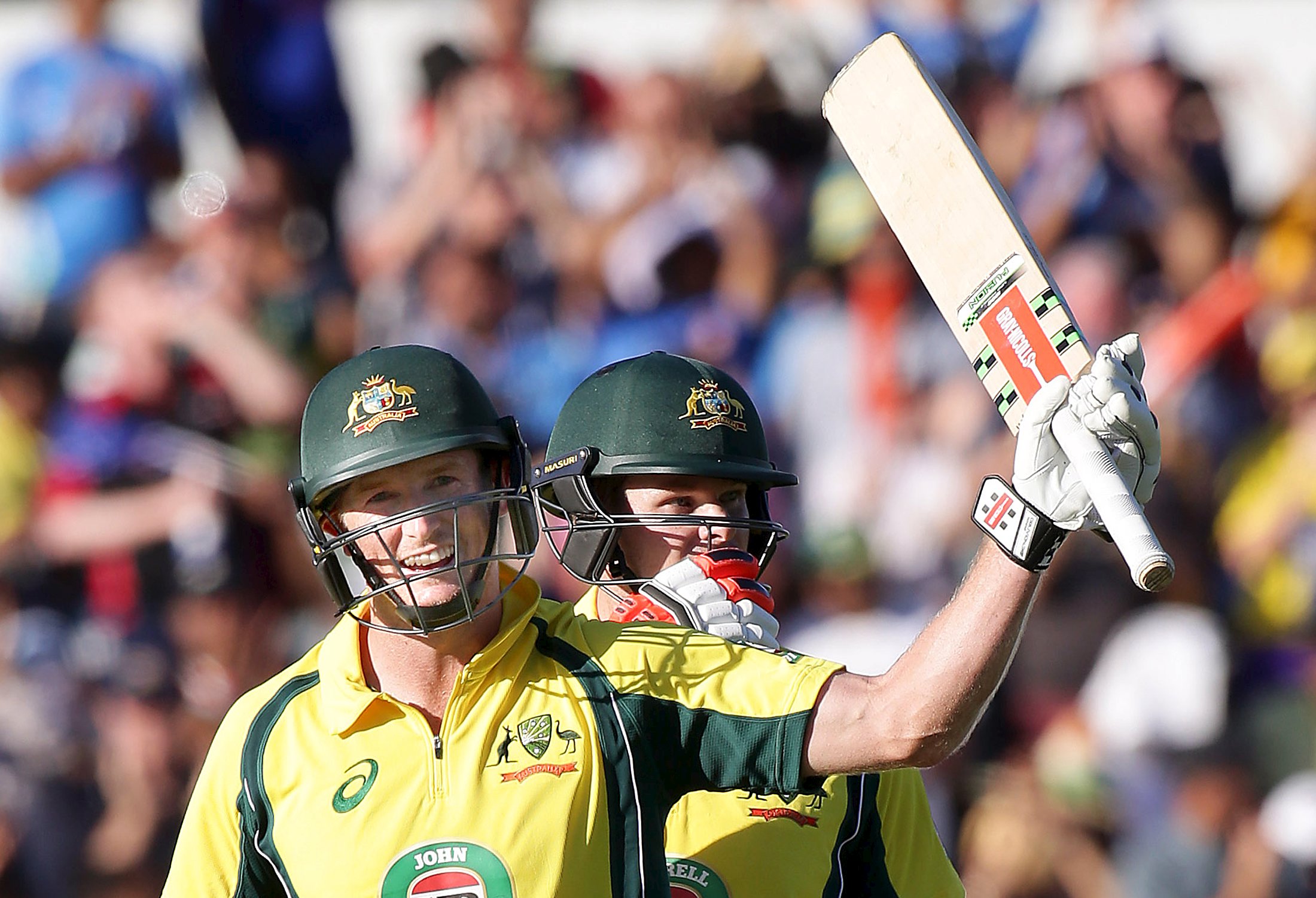 Australia's George Bailey celebrates after making his century during the One Day International cricket match against India in Perth January 12, 2016. Photo: Reuters