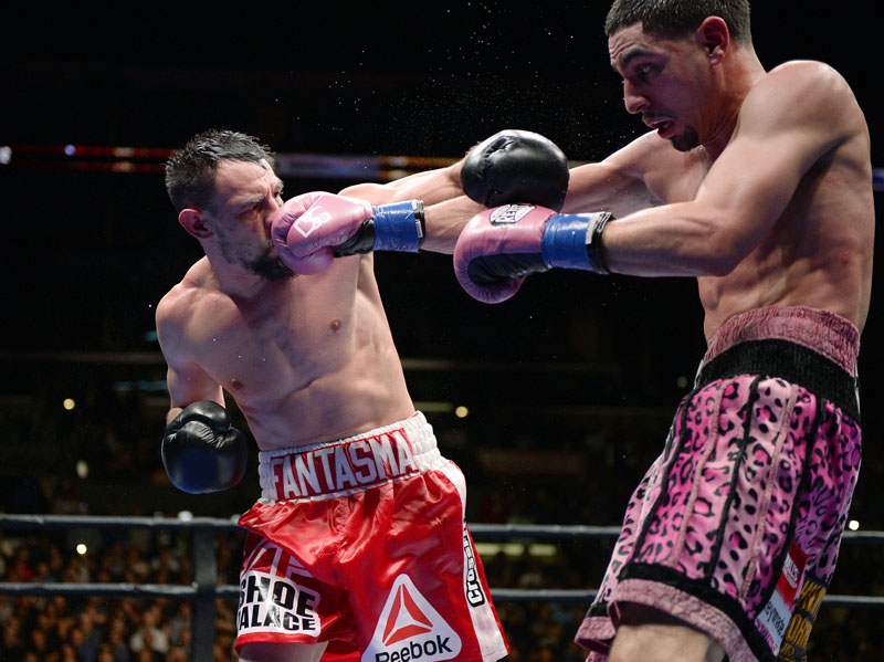 Danny Garcia (right) lands a punch on the face of Robert Guerrero during their WBC welterweight bout at the Staples Center in Los Angeles on Saturday. Photo: AFP