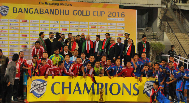 The victorious Nepali team celebrating with the trophy in Bangabandhu National Stadium, in Dhaka, on Friday, January 22, 2016.