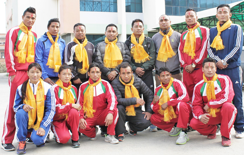 National boxing players pose for photo before their departure.