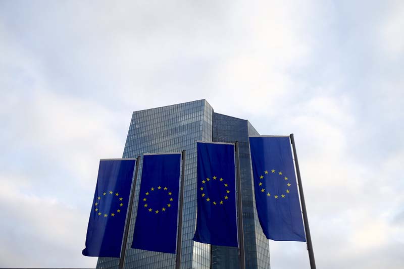 European Union (EU) flags fly in front of the European Central Bank (ECB) headquarters in Frankfurt, Germany, on December 3, 2015. Photo: Reuters