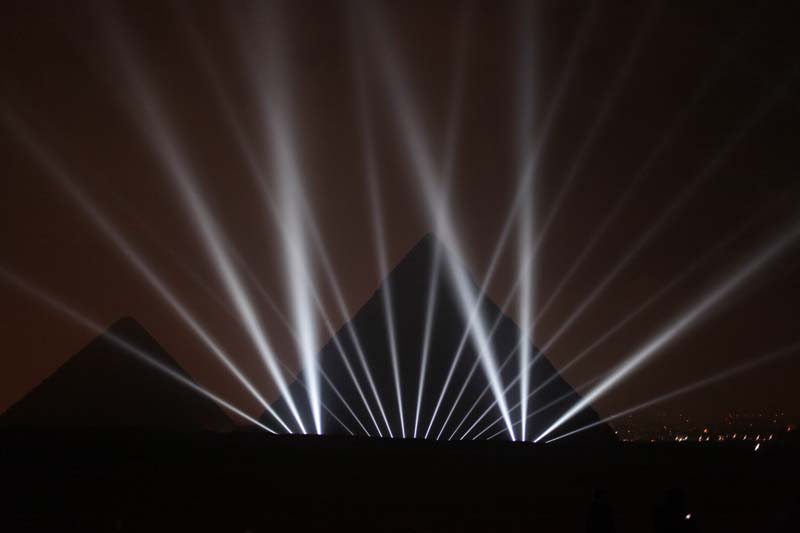 The Great Pyramids are illuminated for New Year's Eve in Giza, near Cairo, Egypt late Thursday, December 31, 2015. Photo: AP