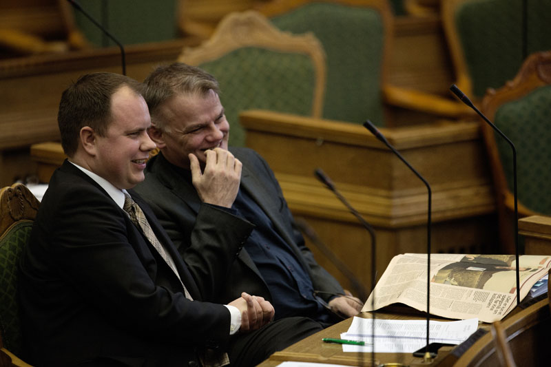 Martin Henriksen (left) and Christian Langballe from The Danish People's Party, sit in Parliament, in Copenhagen on Tuesday January 26, 2016. Photo: Peter Hove Olesen/ POLFOTO via AP