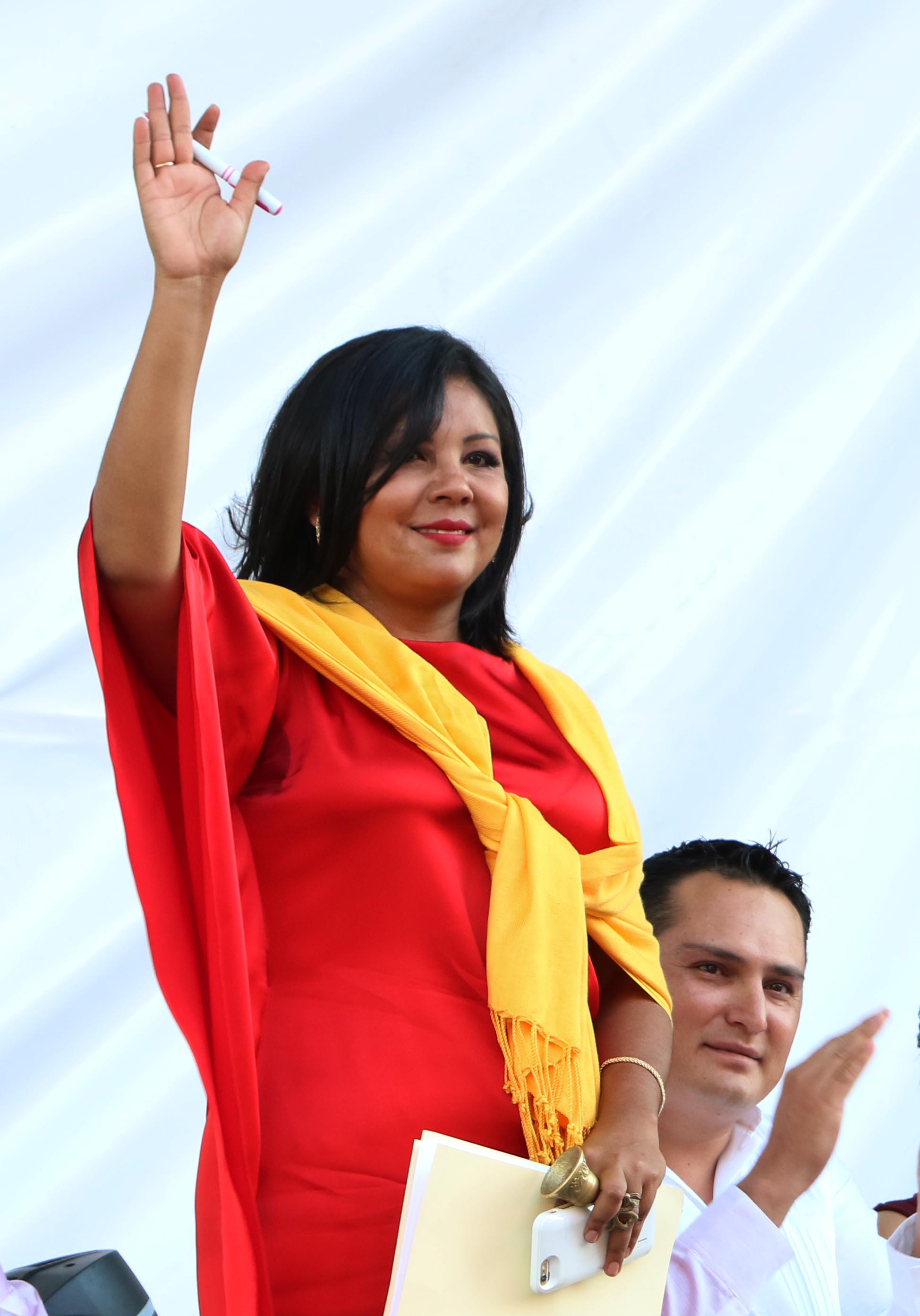 In this Friday, Jan. 1, 2016 photo, Gisela Mota waves during her swearing in ceremony as mayor of Temixco, Morelos State, Mexico. Photo: AP
