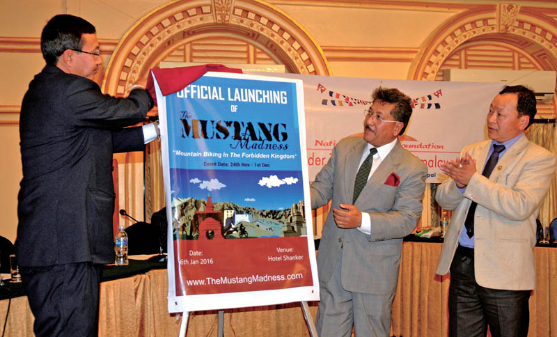 Gobinda Bahadur Karkee, director general of the Department of Tourism, launching the product designed by Himalayan Expedition amidst an interaction programme organised by National Tourism Foundation, in Kathmandu, on Wednesday. Photo: Courtesy NTF