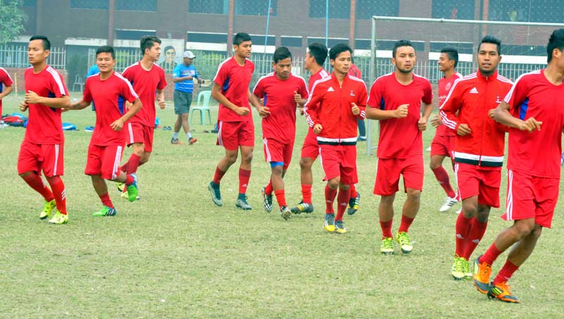 Nepal national football team members take part in a training session in Dhaka on Thursday. Photo Courtesy: ANFA