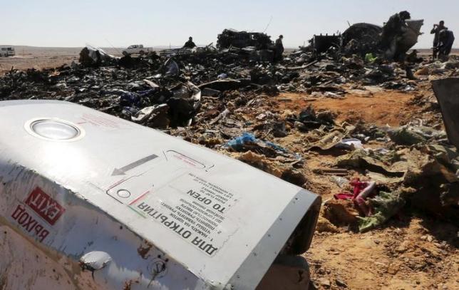 The remains of a Russian airliner are inspected by military investigators at the crashu00a0site at the al-Hasanah area in El Arish city, north Egypt, November 1, 2015. REUTERS/Mohamed Abd El Ghany/Files