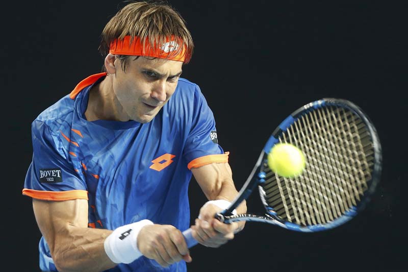 Spain's David Ferrer hits a shot during his fourth round match against John Isner of the US at the Australian Open tennis tournament at Melbourne Park, Australia, on January 25, 2016. Photo: Reuters