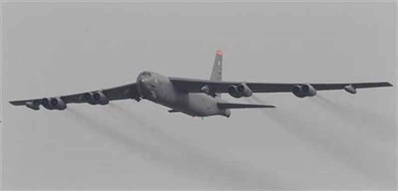 A US Air Force B-52 bomber flies over Osan Air Base in Pyeongtaek, South Korea, Sunday, Jan. 10, 2016. The powerful U.S. B-52 bomber flew low over South Korea on Sunday, a clear show of force from the United States as a Cold War-style standoff deepened between its ally Seoul and North Korea following Pyongyang's fourth nuclear test. Photo: AP