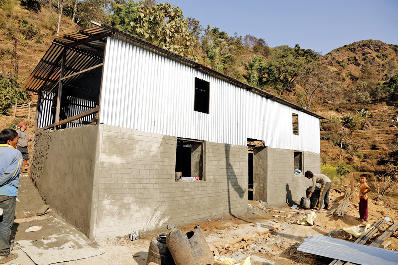 Quake survivors building earhquake resistant house in their own expenses in Batase, Sindhulpalchok district on Wednesday, January 27, 2016. Photo: RSS