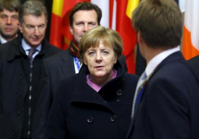 Germany's Chancellor Angela Merkel leaves the European Council building during a European Union leaders summit addressing the talks about the so-called Brexit and the migrants crisis, in Brussels, Belgium, February 19, 2016.    REUTERS/Yves Herman