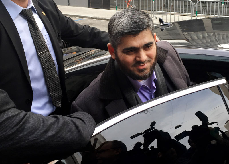 Army of Islam official Mohammed Alloush, gets in to a car heading to a meeting with the opposition's High Negotiations Committee, in Geneva, Switzerland, on Tuesday, February 2, 2016. Photo: AP