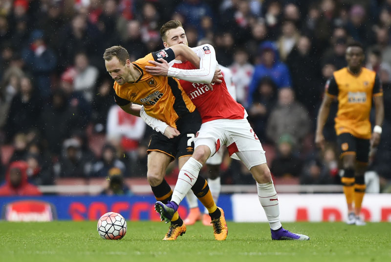 Arsenal's Calum Chambers (right) in action with Hull City's David Meyler in FA Cup Fifth Round at Emirates Stadium, on Saturday, February 20, 2016. Photo: Reuters
