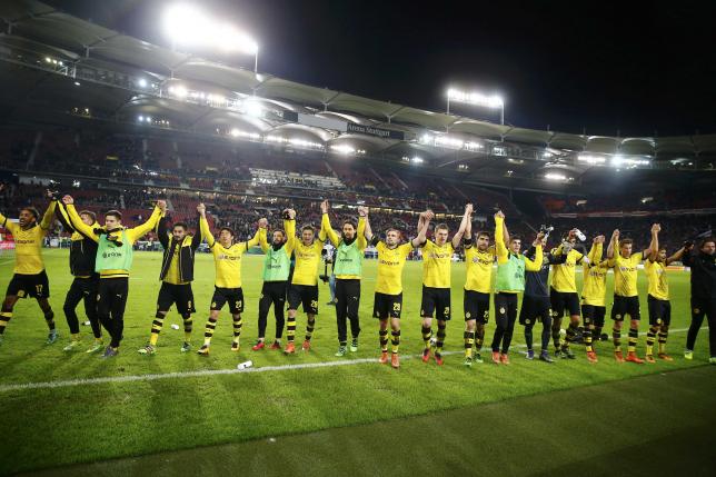 Borussia Dortmund's players celebrate after the match on February 9, 2016. REUTERS/Kai Pfaffenbach
