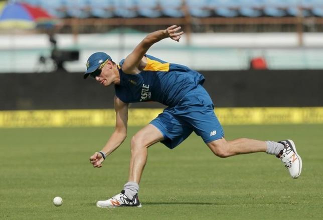 South Africa's Chris Morris tries to collect a ball during a practice session ahead of their third one-day international cricket match against India in Rajkot, India, October 17, 2015. REUTERS/Danish Siddiqui