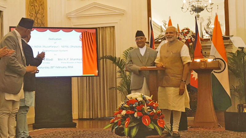 Prime Minister KP Sharma Oli and his Indian counterpart PM Narendra Modi jointly tele-inaugurating  Dhalkebar-Muzaffarpur cross-border transmission line, in New Delhi, on Saturday. Photo: MEA of India