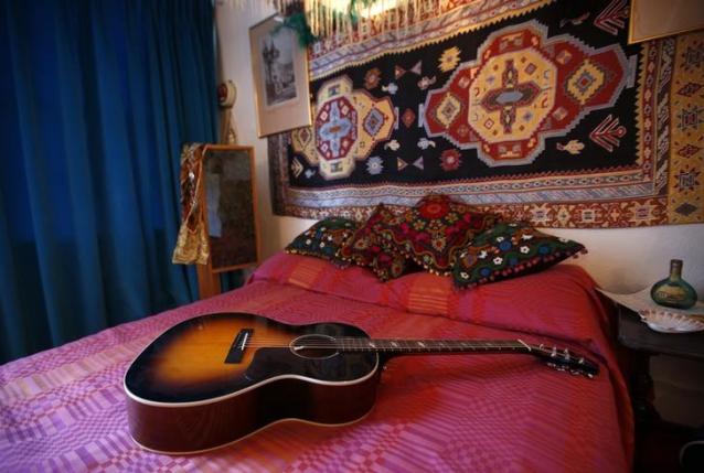 Replica items, including a guitar, in the bedroom of the home where Jimi Hendrix and girlfriend Kathy Etchingham lived in 1968-69  London, February 8, 2016. REUTERS/Peter Nicholls