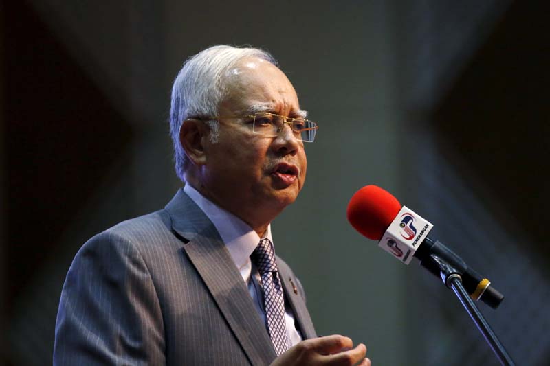 Malaysia's Prime Minister Najib Razak announces revisions to the fiscal budget in Putrajaya, Malaysia, on January 28, 2016. Photo: Reuters