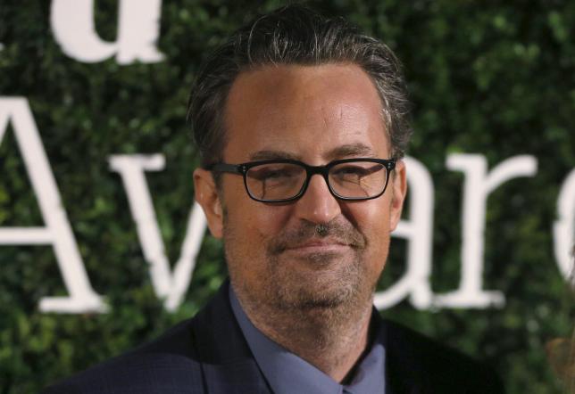 U.S. actor Matthew Perry poses for photographers at the Evening Standard British Film Awards in London, Britain, in this February 7, 2016 file picture. REUTERS/Neil Hall/Files