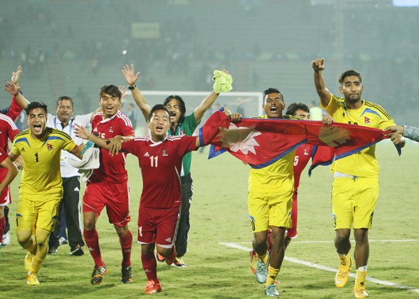 Nepal players celebrate after defeating India 2-1 in SAG men's football finals. Photo: SAG