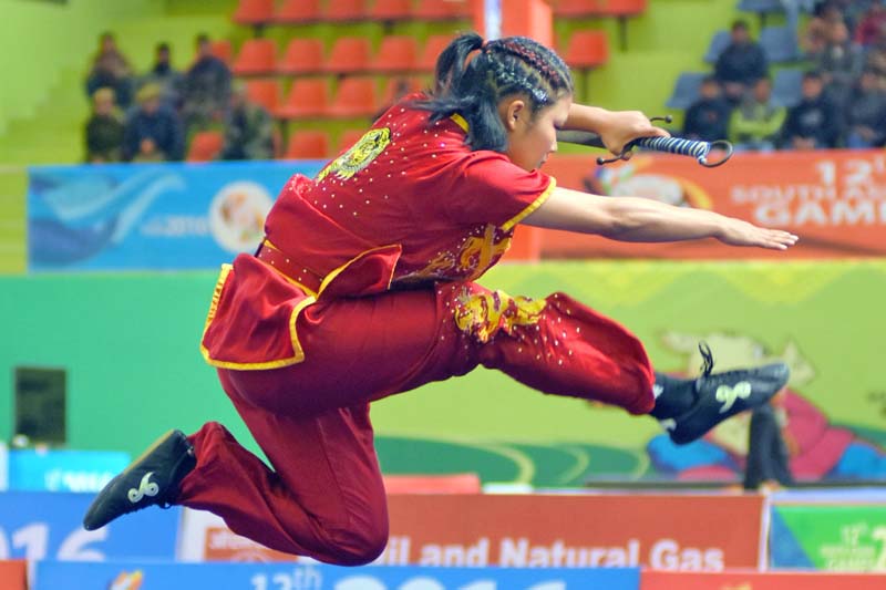 Nepali wushu player, Nima Gharti Magar, performing at the 12th South Asian Games, in Shilong of India, on Monday, February 8, 2016. Courtesy: Photojournalist Club