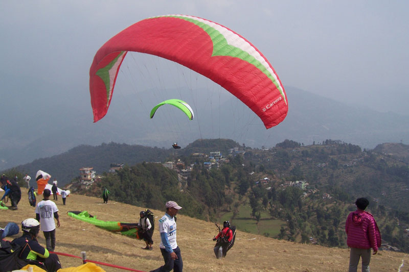 The paragliders gather at Sarangkot to practice paragliding prior to the Paragliding Pre-World Cup, an eight-day event, organised by Nepal Air Sports Association (NAA) and supported by Nepal Tourism Board, on Saturday, February 27, 2016. Photo: Rup Narayan Dhakal