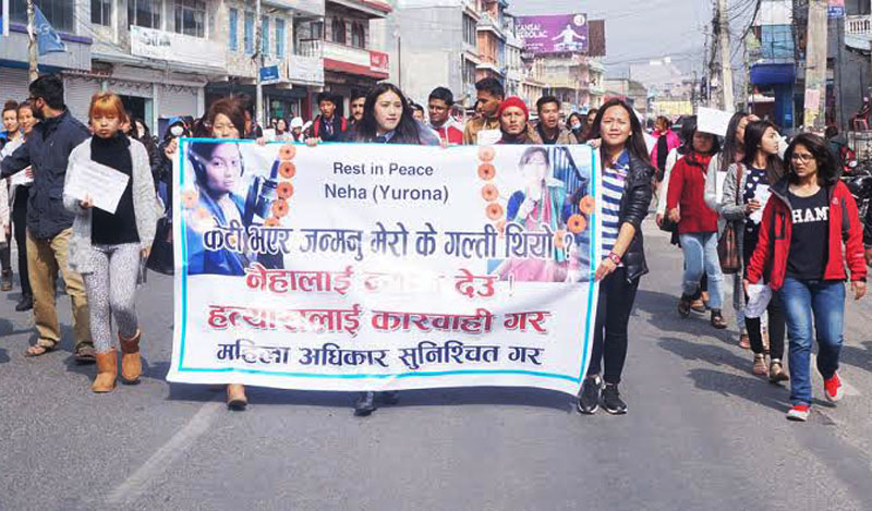 Participants taking part in a rally taken out to protest the murder of 19-year-old Neha Pun in Pokhara on Thursday, February 4, 2016. Pun was found dead on the bank of Seti River on Tuesday morning. Photo: Bharat Koirala