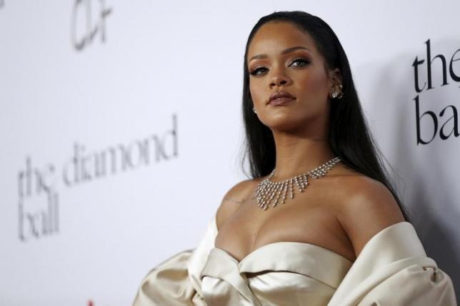 Singer Rihanna poses at the second annual Diamond Ball fundraising event in Santa Monica, California December 10, 2015.  REUTERS/Mario Anzuoni